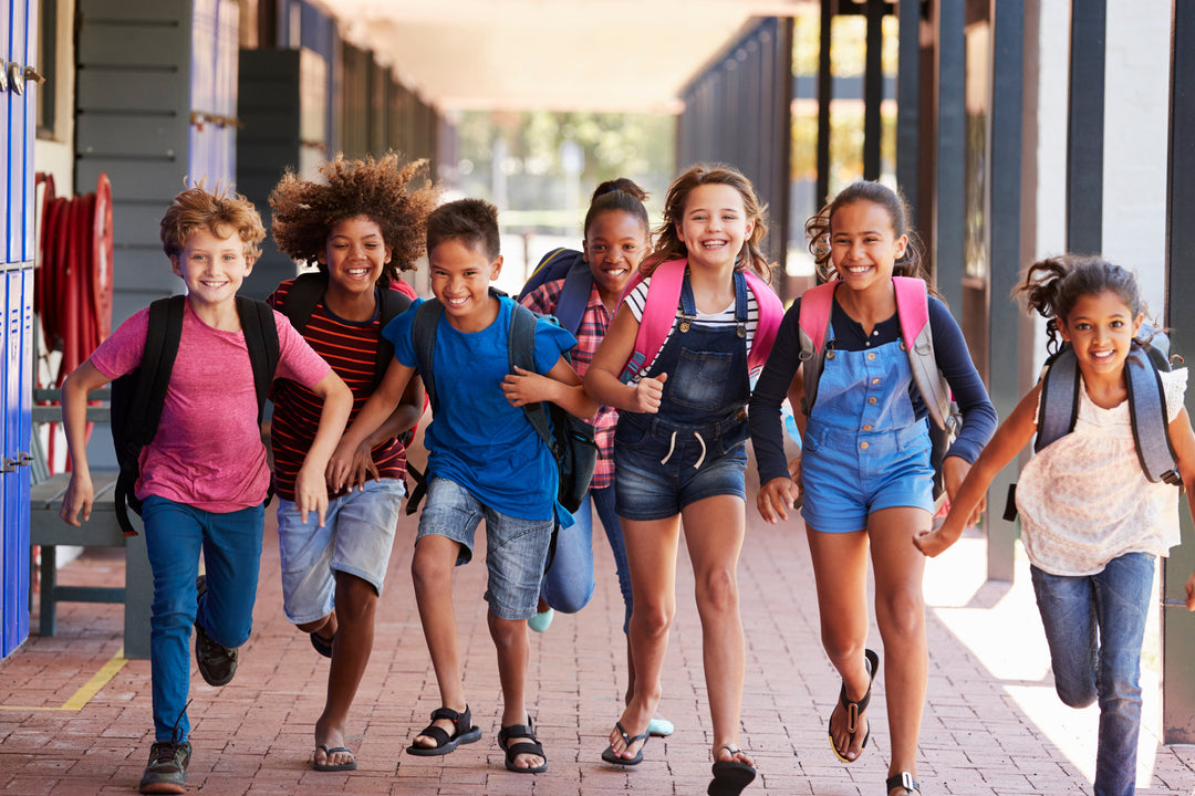 children running in a hallway